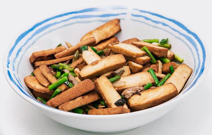 Chinese vegetables sautéed with smoked tofu